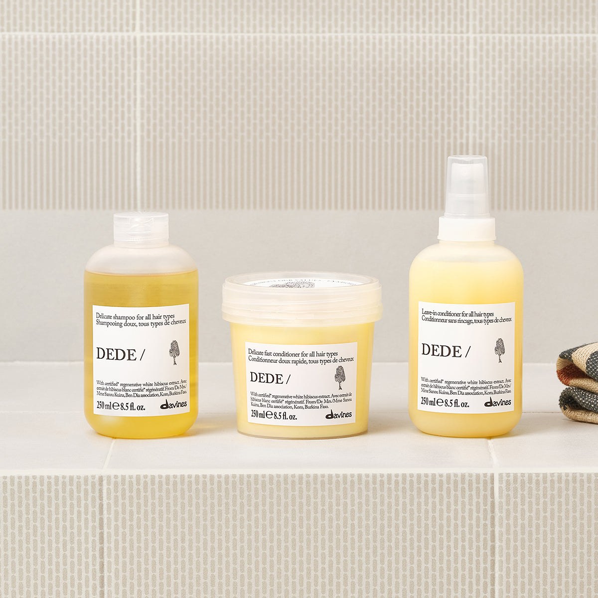 Davines DEDE Conditioner with the DEDE range on a bathroom shelf